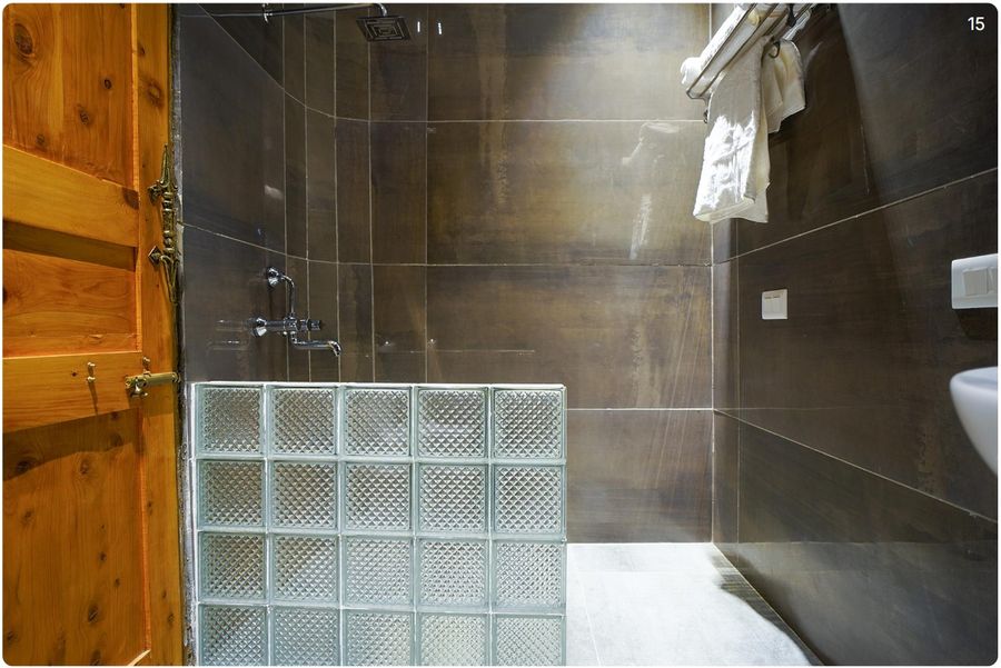 Glass block shower washroom inside cottage in mussoorie