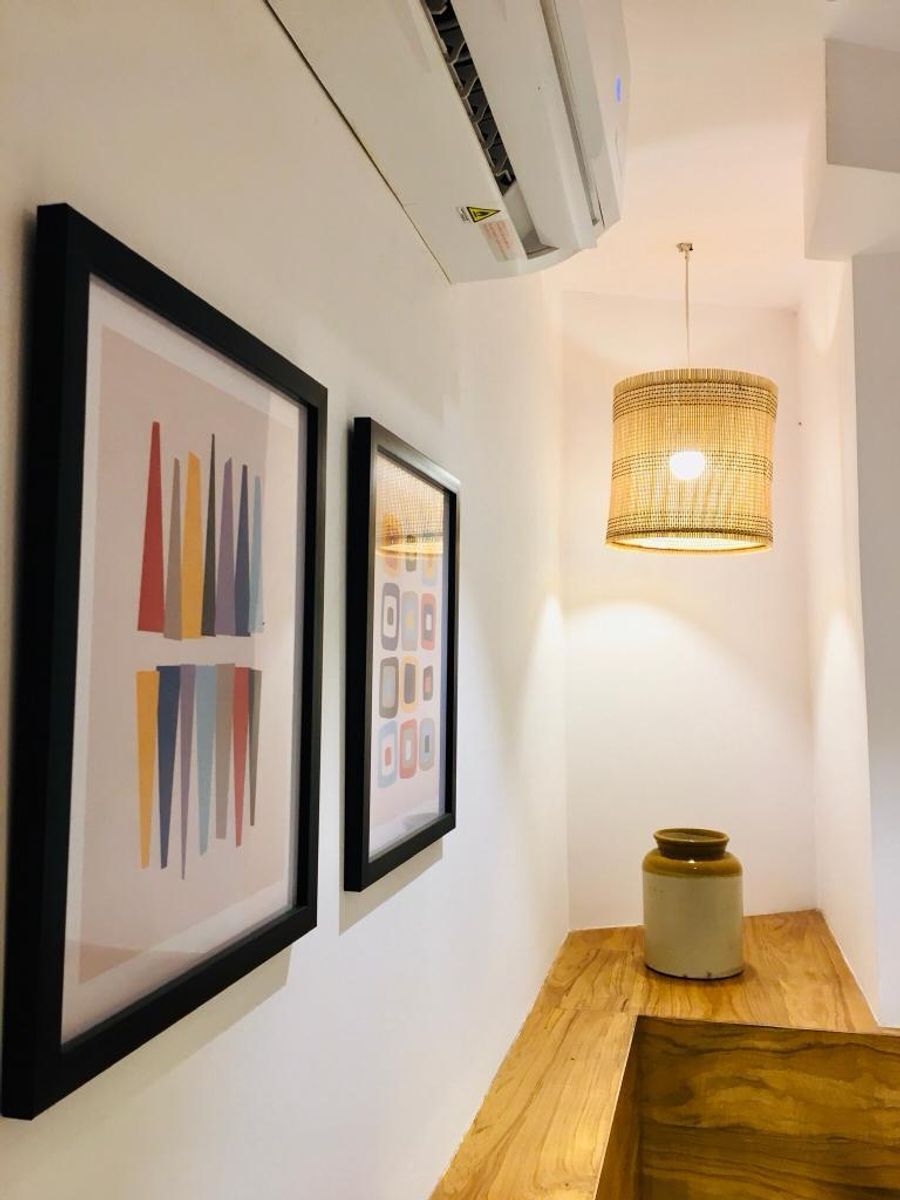 Framed modern wall art decor inside solo pod room 303 goa
