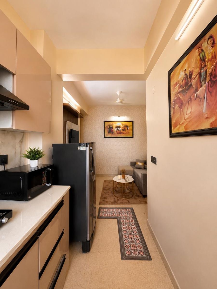 Open kitchenette and hallway view tiny home homestay karnal