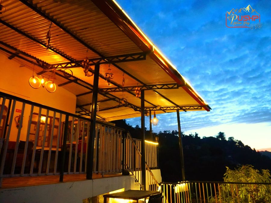 Covered balcony deck view pushp homestay mussoorie
