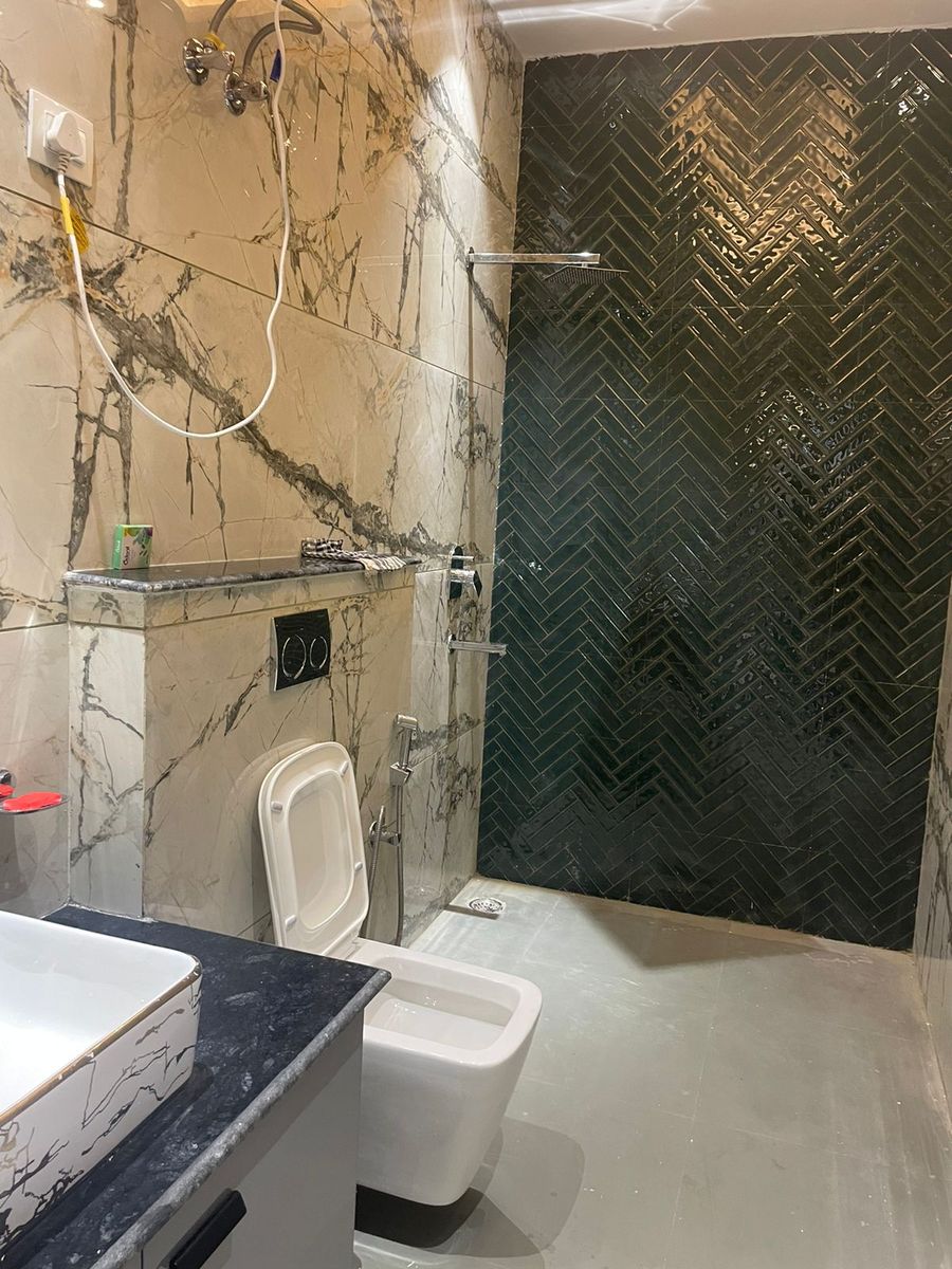 Modern shower glass bathroom at luxury villa gurugram