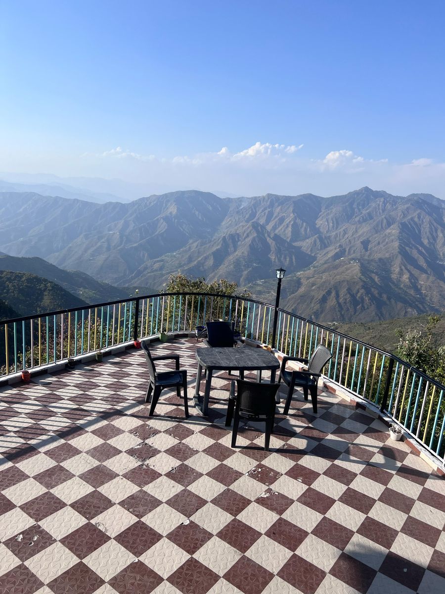 Rooftop terrace seating view pushp homestay mussoorie