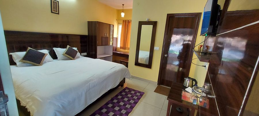 Comfortable double bedroom suite at ghai's sunrise homestay