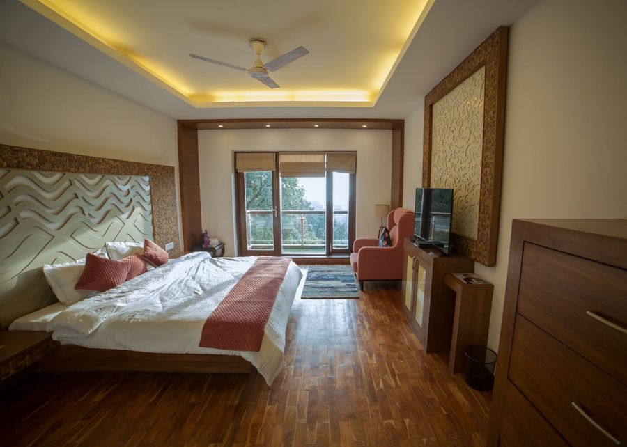 Cozy bedroom with large window ridgewood manor homestay