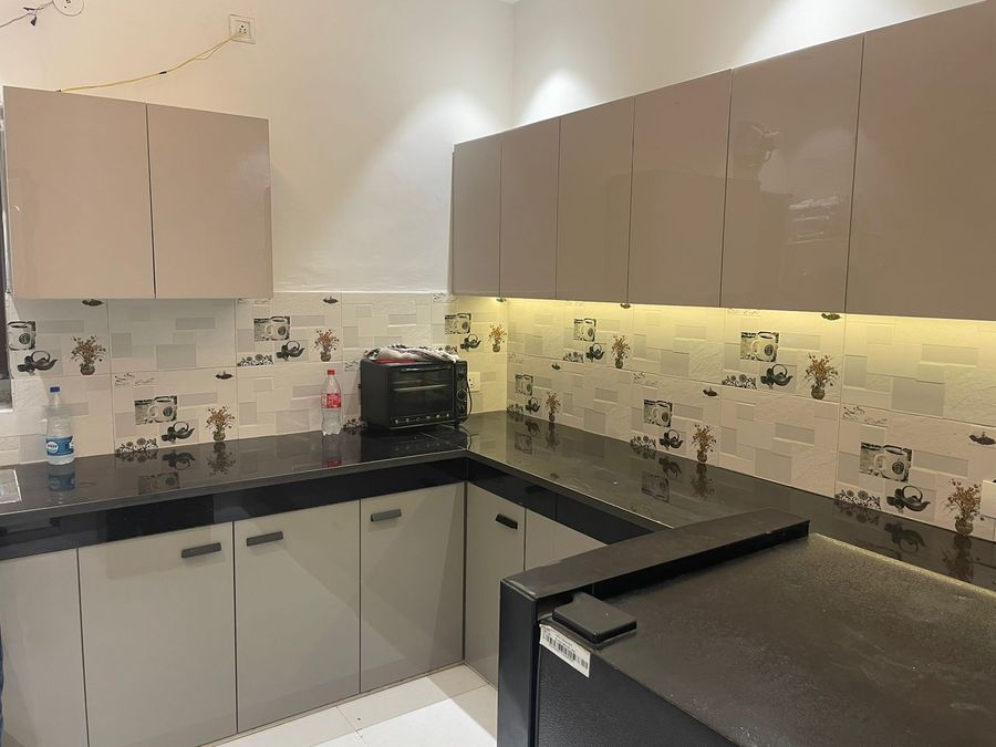 Modular kitchen counter at luxury villa in gurugram