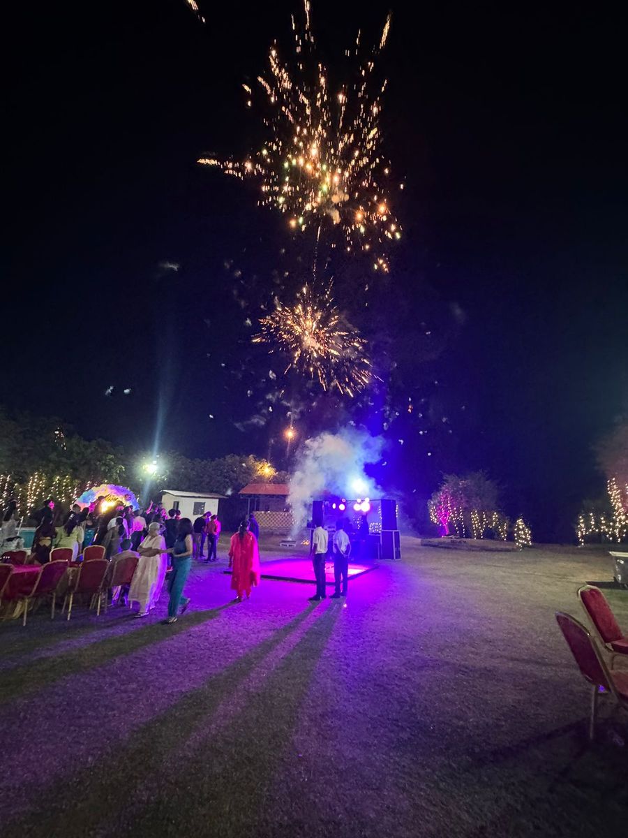 Night party lawn with fireworks near by farmhouse gurgaon