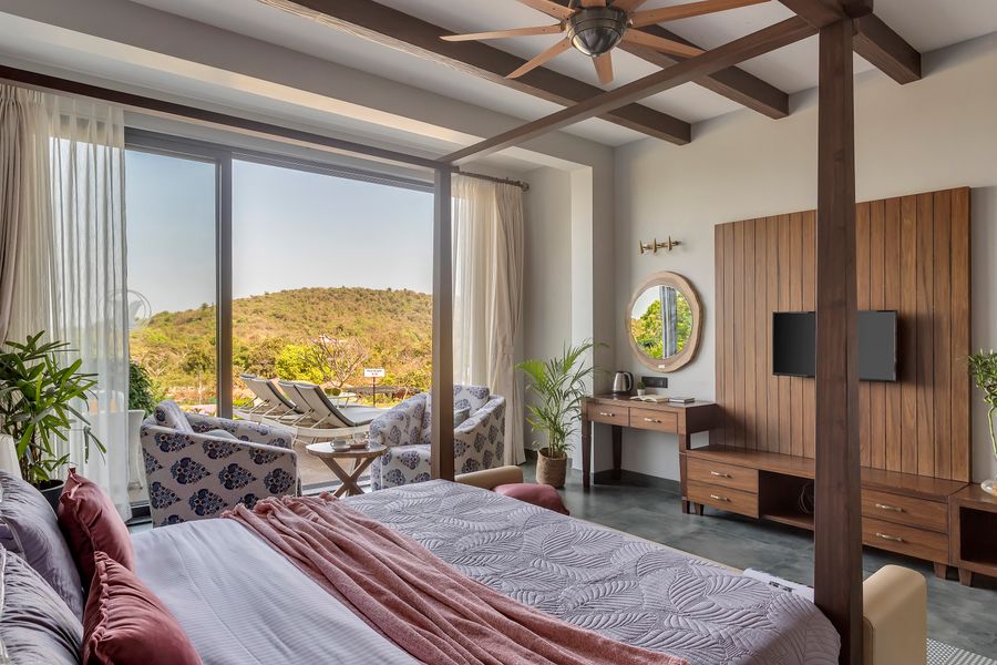 Modern bedroom with mountain view at lavender villa goa