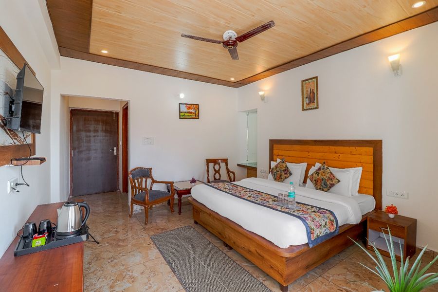 Spacious master bedroom interior hotel in dehradun