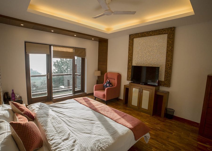 Sunlit valley view bedroom at ridgewood manor homestay