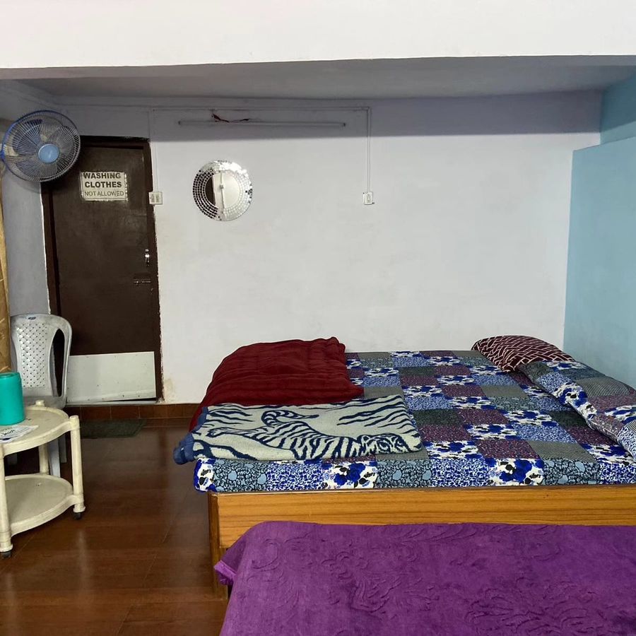 Comfortable double bed interior at sunny home stay