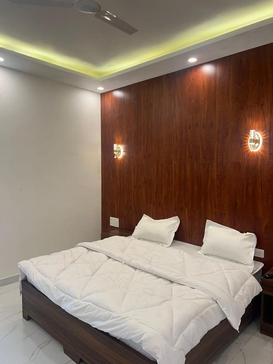 Spacious master bedroom interior luxury farmhouse gurgaon