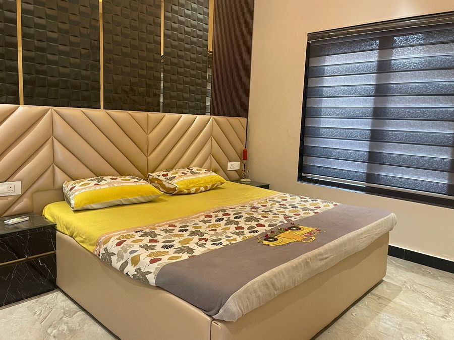 Comfortable master bedroom at luxury villa gurugram