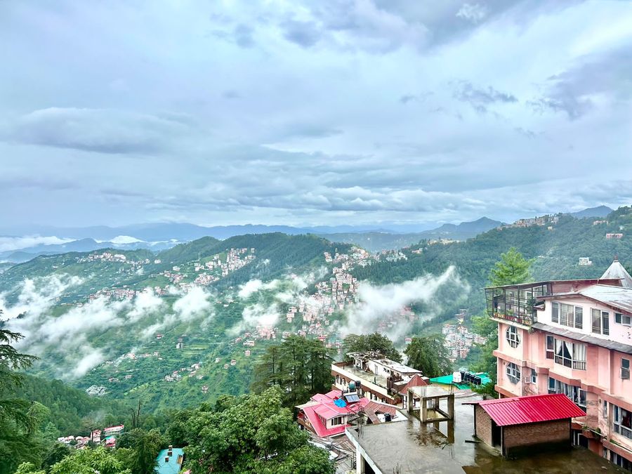 Misty mountain valley landscape view from hotel in shimla