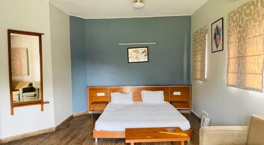 Cozy double bed guest bedroom royal stay farm house gurgaon
