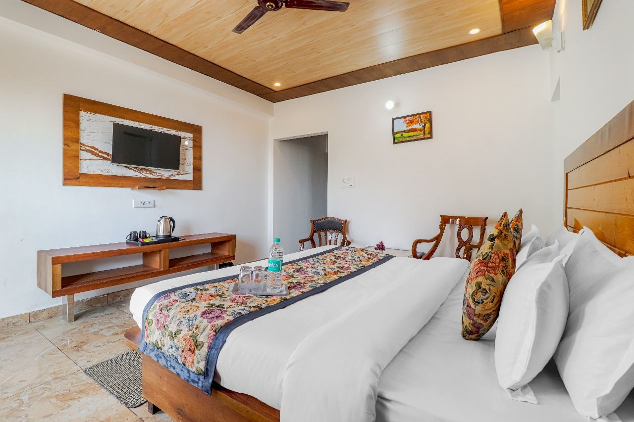 Cozy bedroom with double bed apartments in dehradun